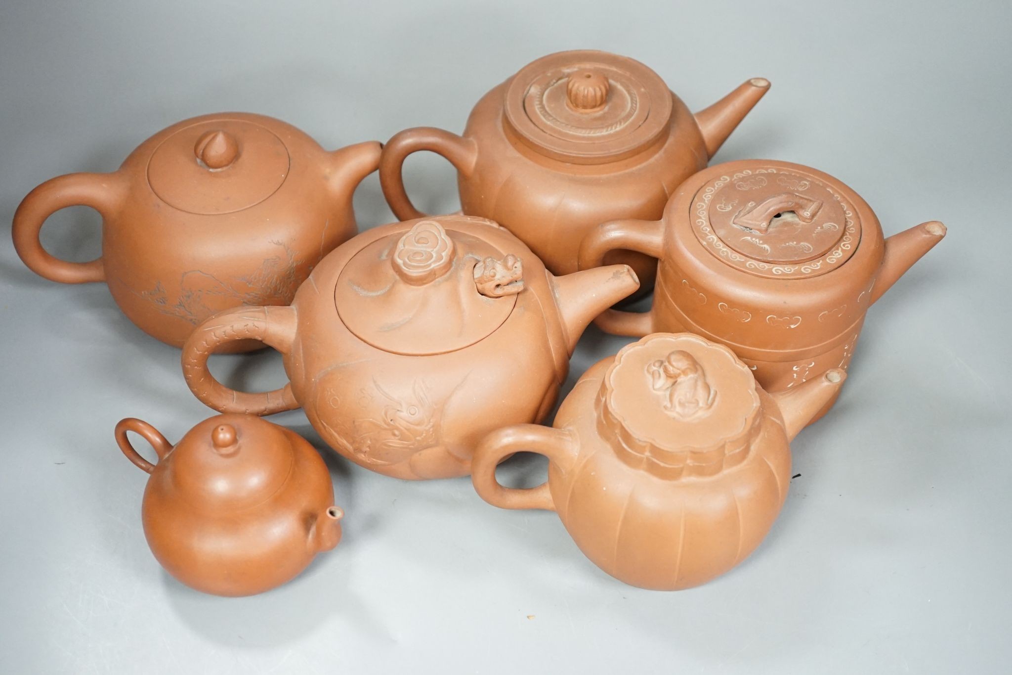 Six Chinese Yixing teapots, tallest 11cm